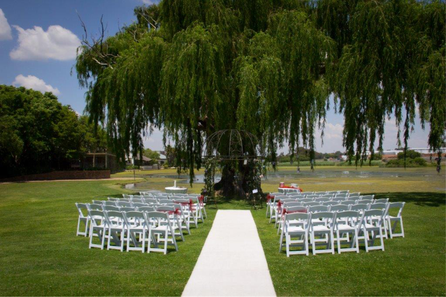Ceremony set up at Willow tree overlooking Lake Umuzi